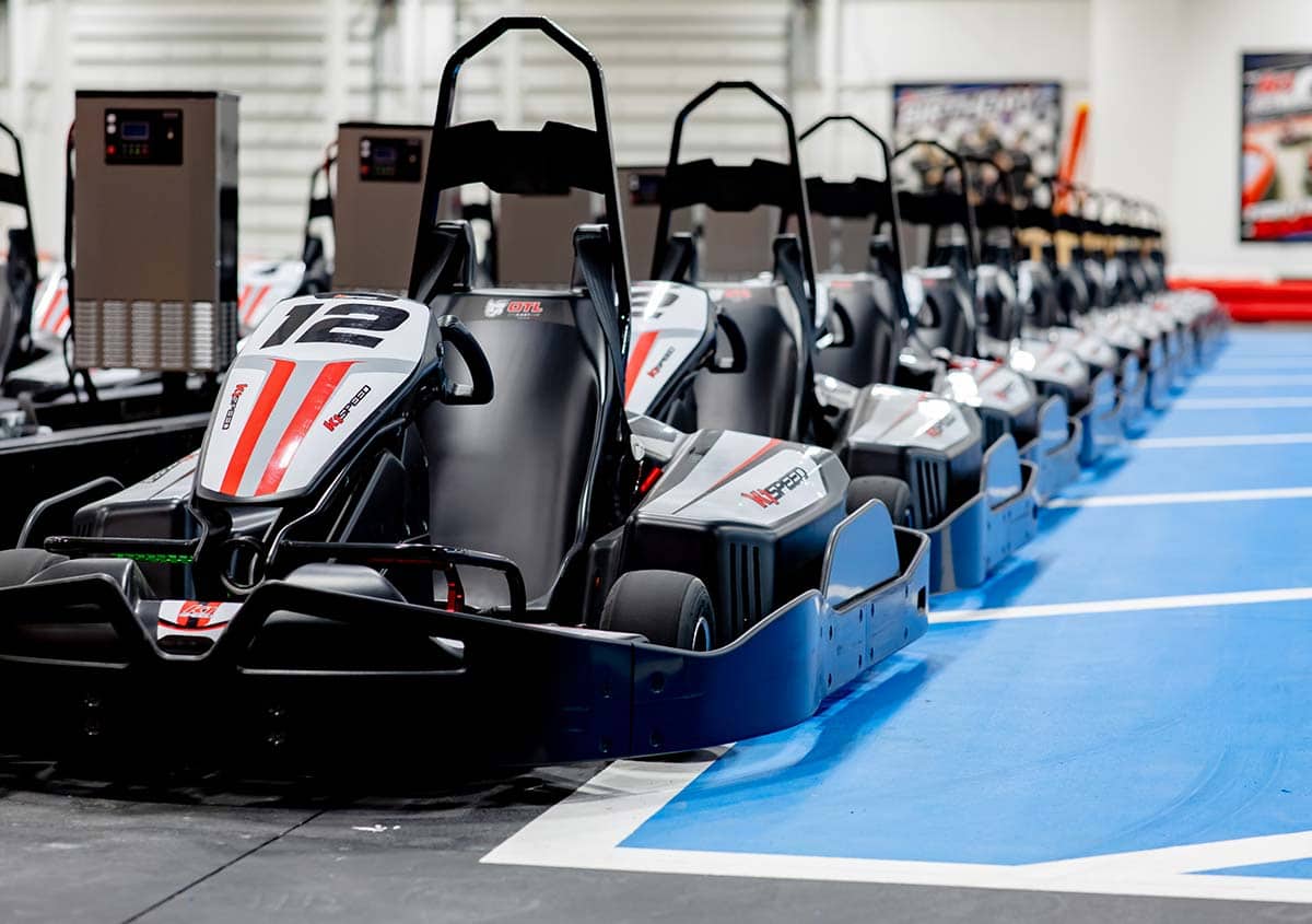 row of indoor electric go karts